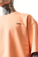 Respire Injection Printed Oversized T-Shirt Peach